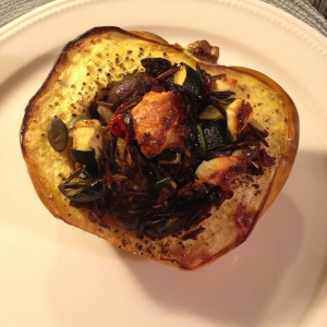 Acorn squash roasted and stuffed with superfood wild rice! Topped with goat cheese of course!